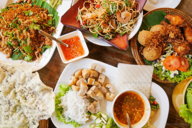 What Role Does Fresh Herb Garnish Play in Vietnamese Noodle Culture?